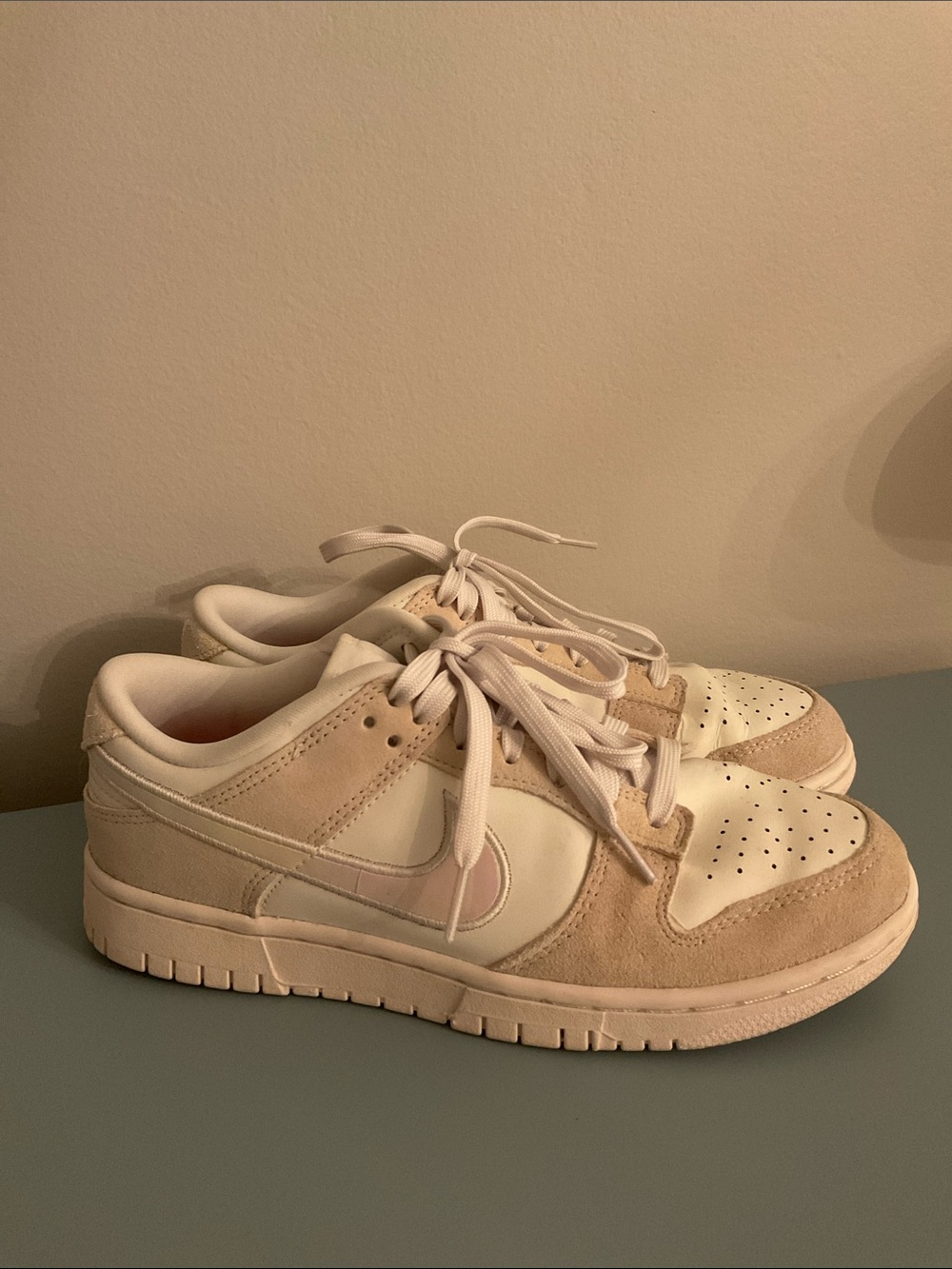 Nike women’s  Low-Top Sneakers in Cream and White with Iridescent Swoosh